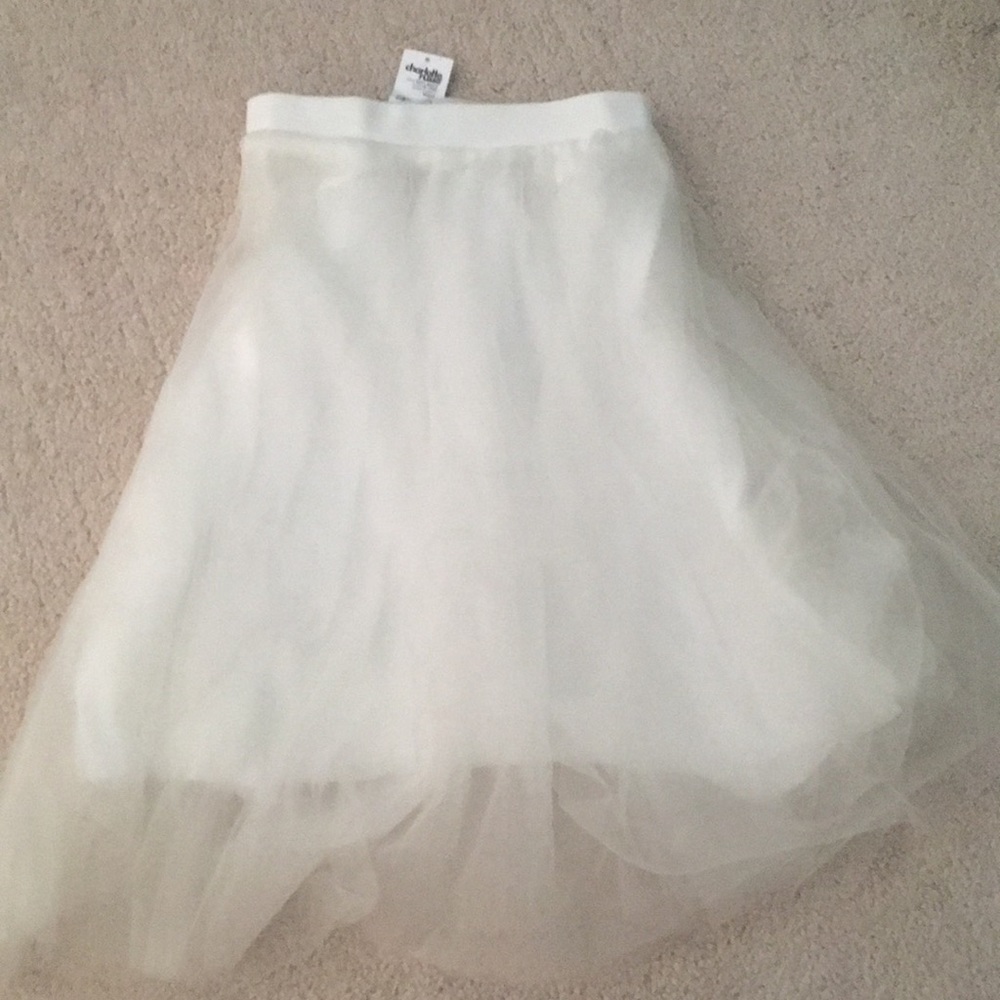 white tutu with tool and an under skirt